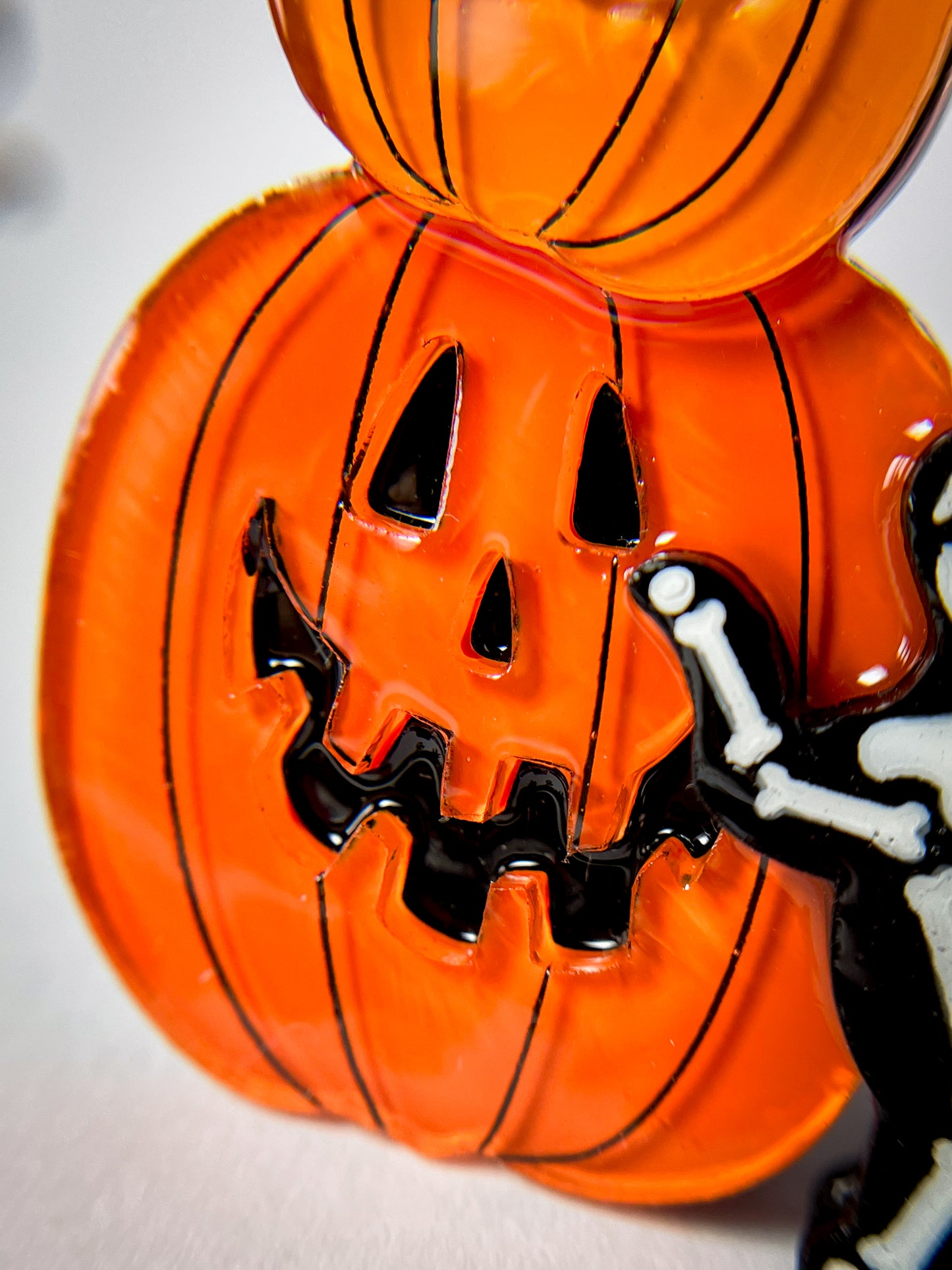 Jack-o'-Lanterns with a skeleton kitty brooch