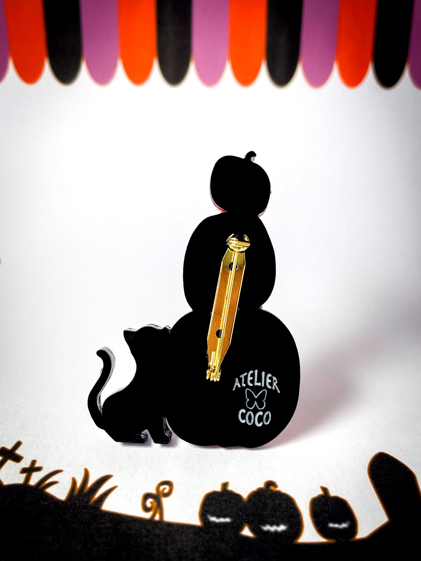 Jack-o'-Lanterns with a skeleton kitty brooch