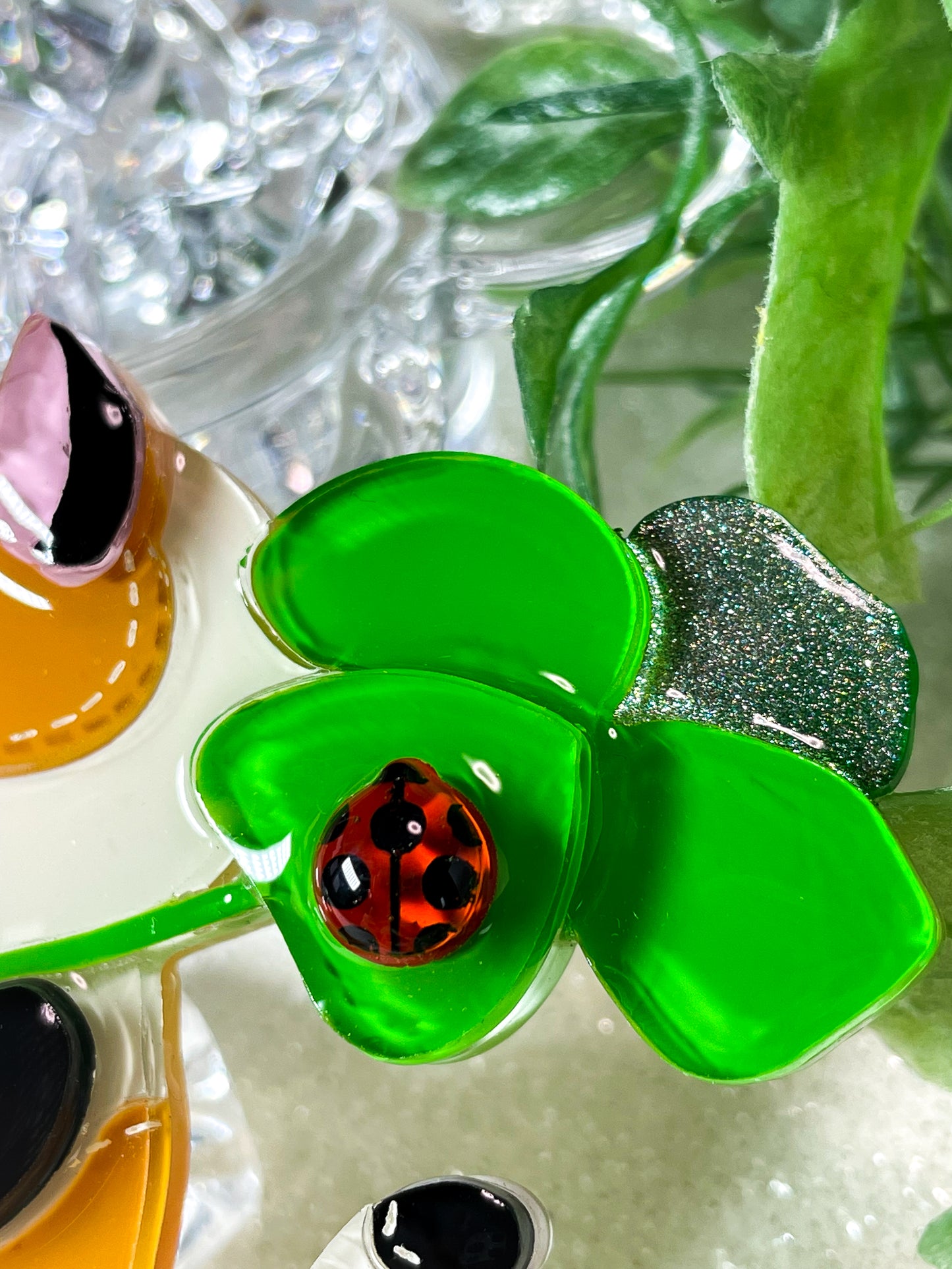 Stitch cat with lucky clover and ladybug