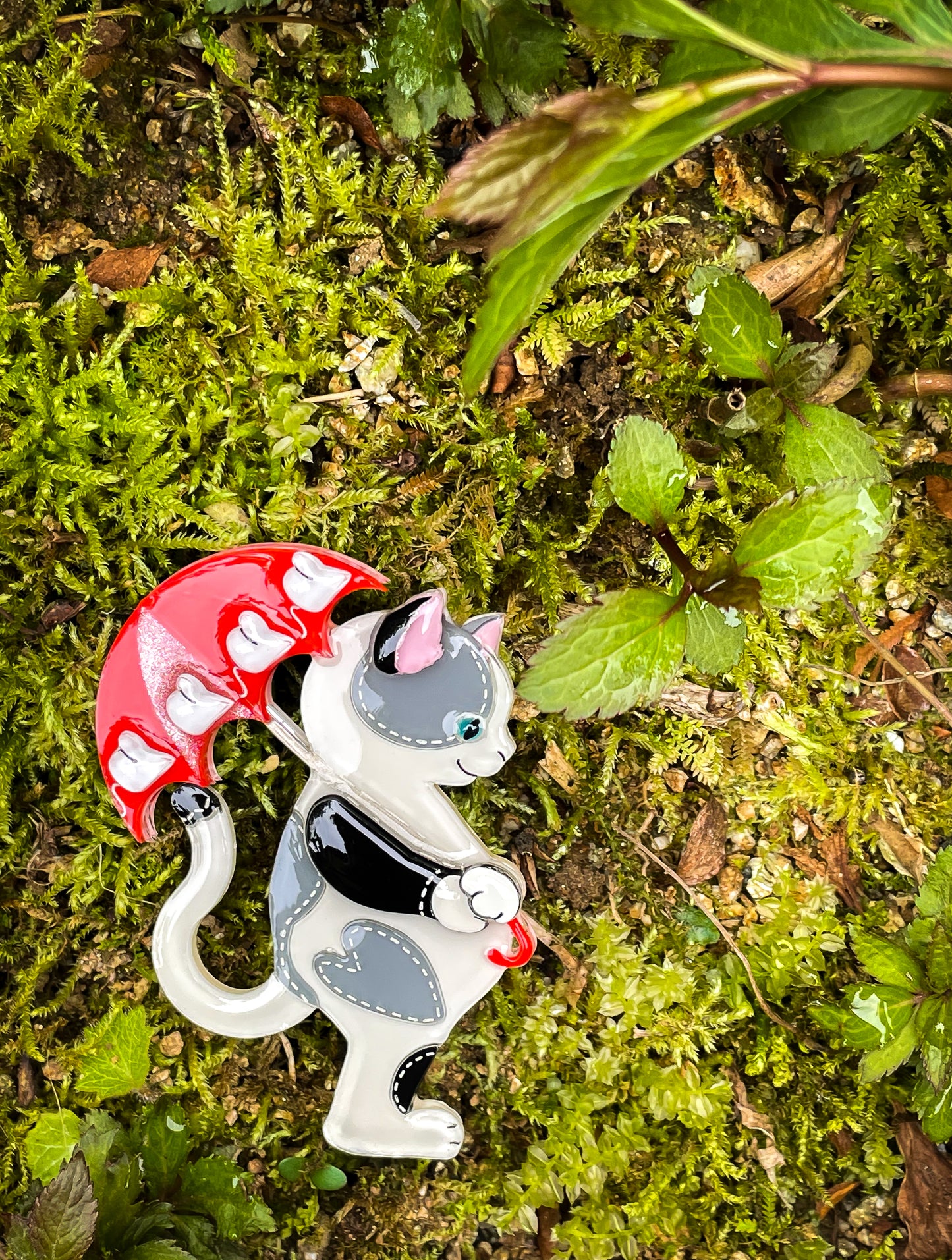 Stitch cat with red mouse umbrella