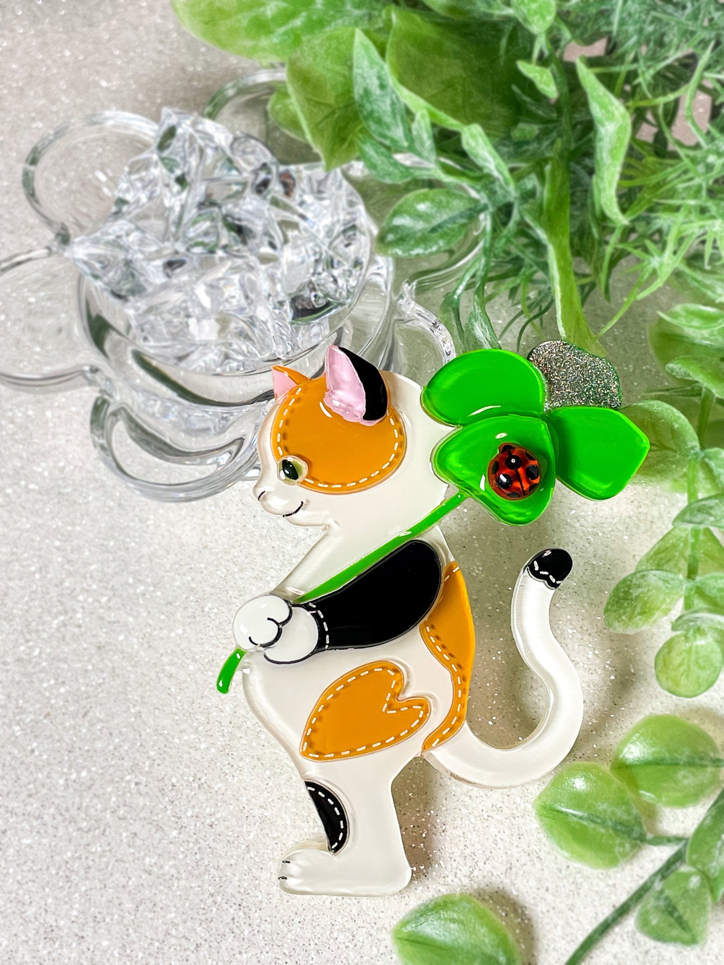 Stitch cat with lucky clover and ladybug