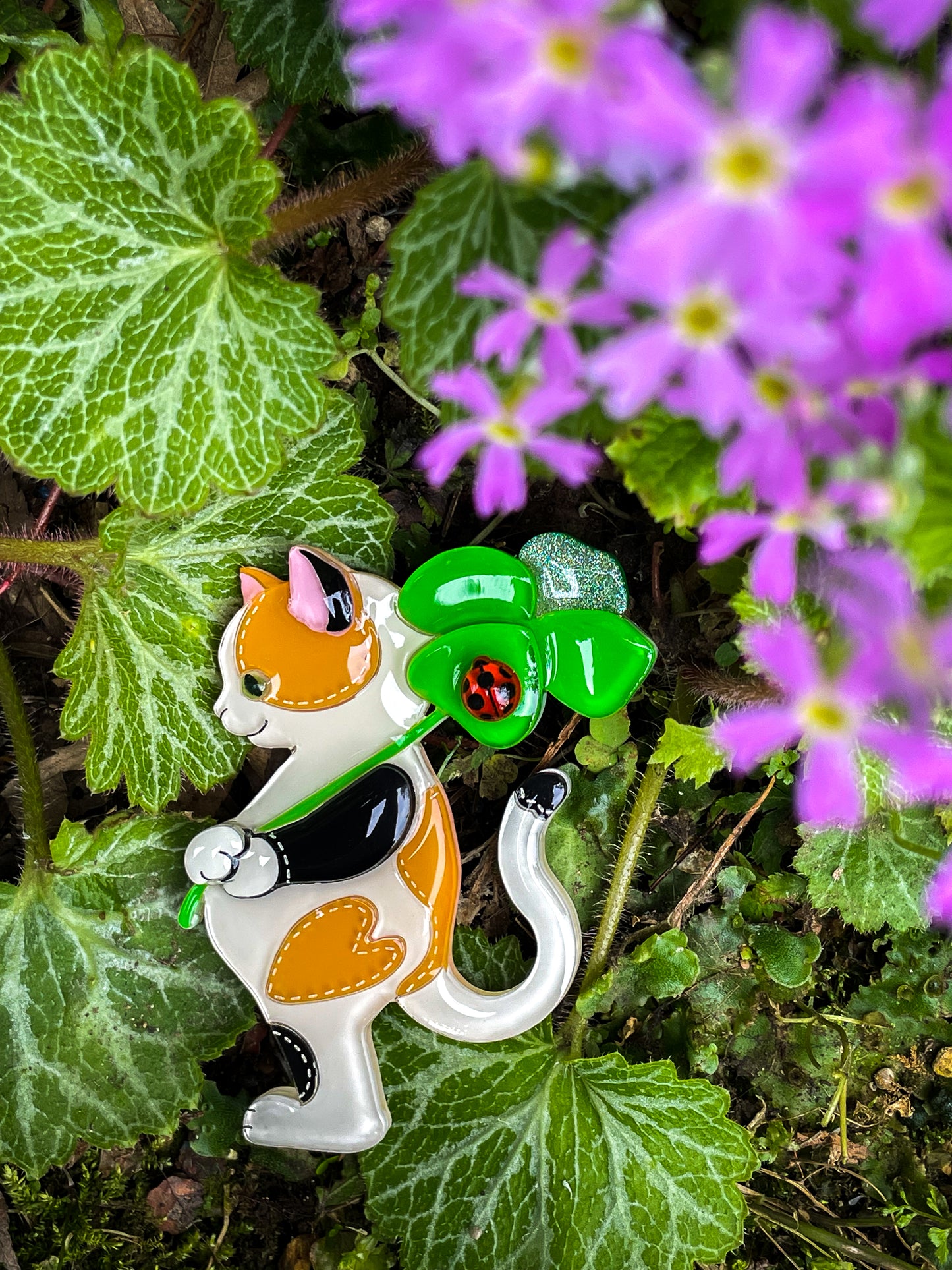 Stitch cat with lucky clover and ladybug