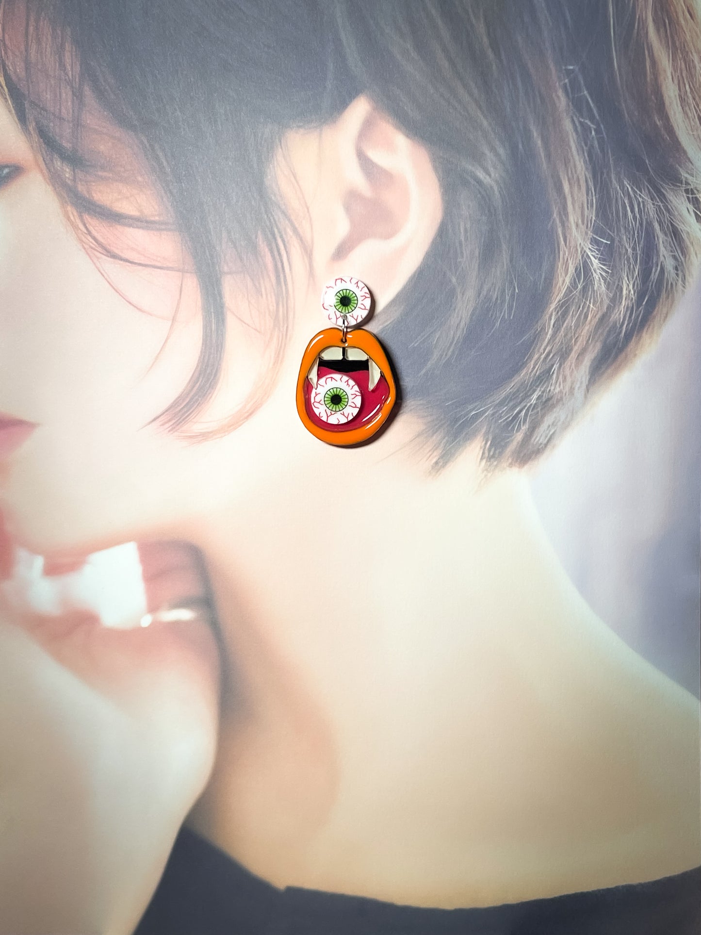 Eating Eyeball Earrings (Orange Lip)